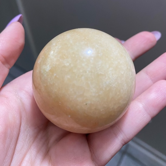 Small honey calcite crystal sphere. - Picture 2 of 4